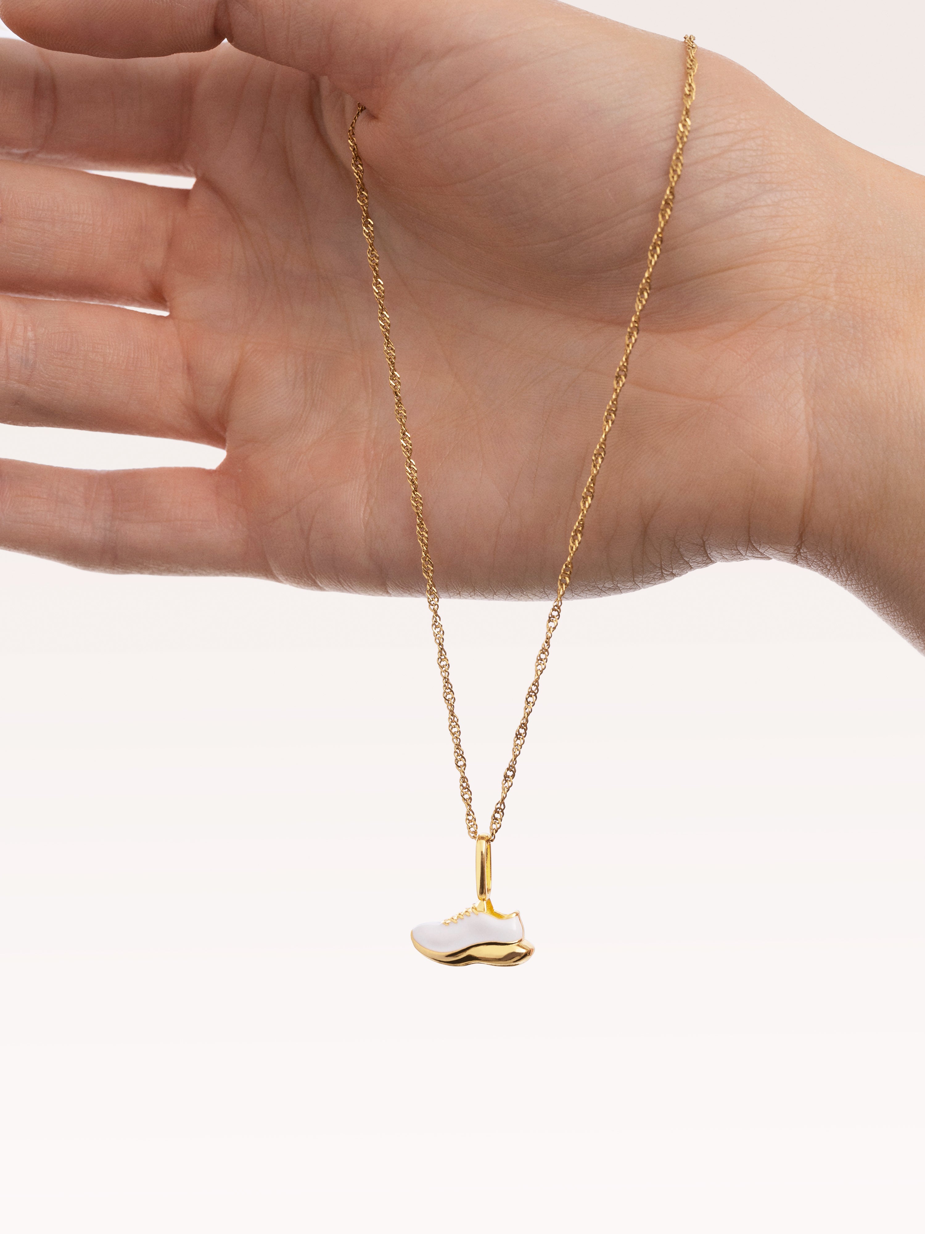 Running Charm Edelstahl, vergoldet